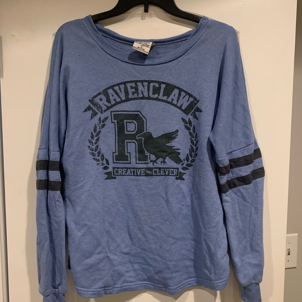 Gently used Ravenclaw long sleeve shirt. Very lightweight. Good condition